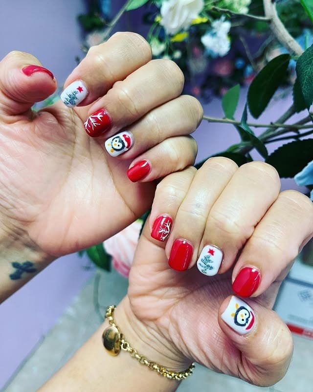 12. Red and White Holiday Penguin Short Nails - penguin nail ideas