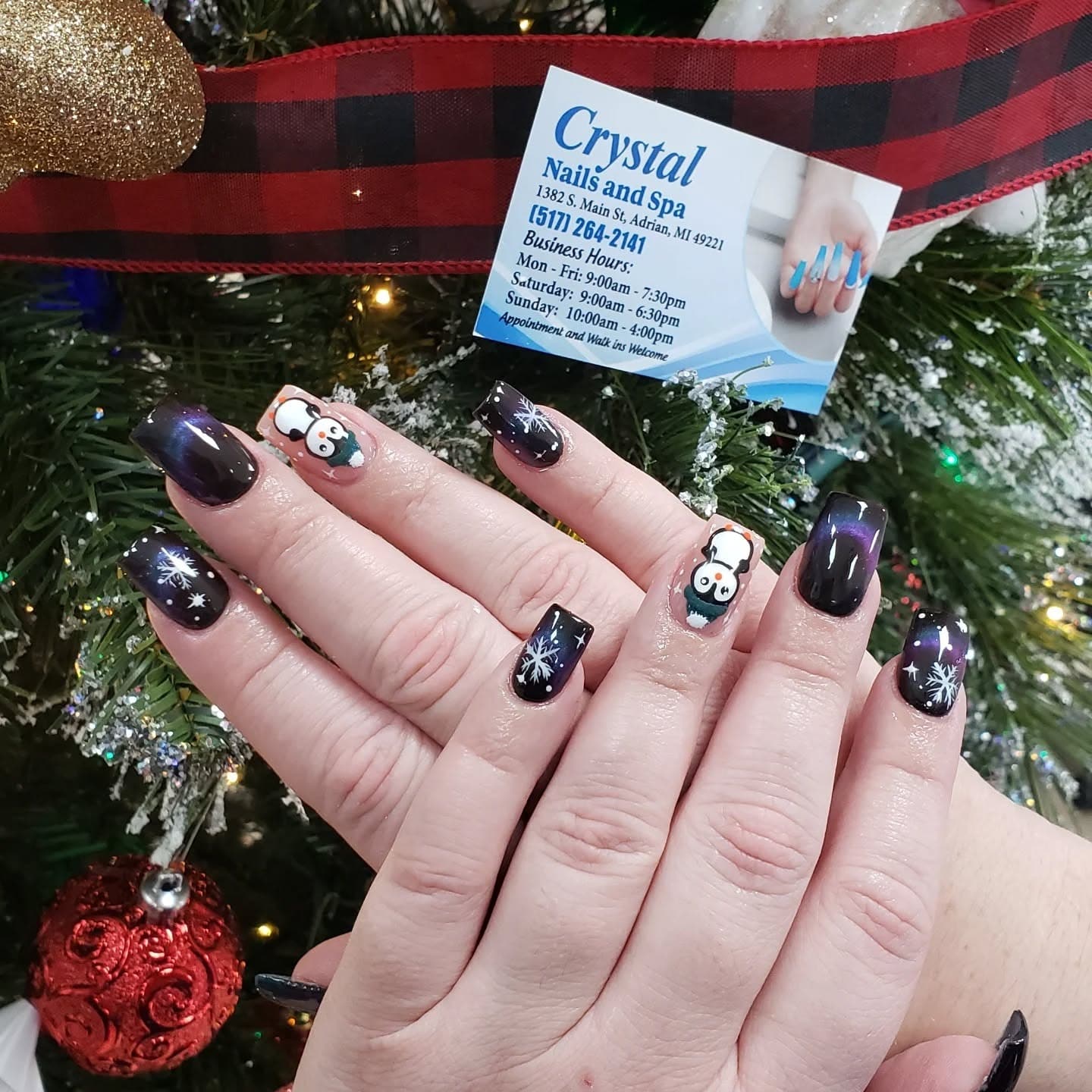 14. Midnight Galaxy Penguin Winter Nails - penguin nail ideas