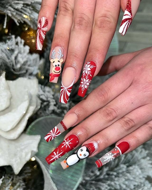 17. Red Candy Cane Penguin Statement Nails - penguin nail ideas