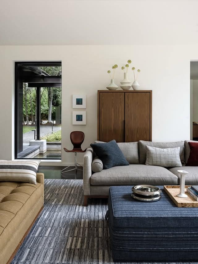 3. Modern Navy and Gray with Natural Wood Storage - navy blue and gray living room ideas