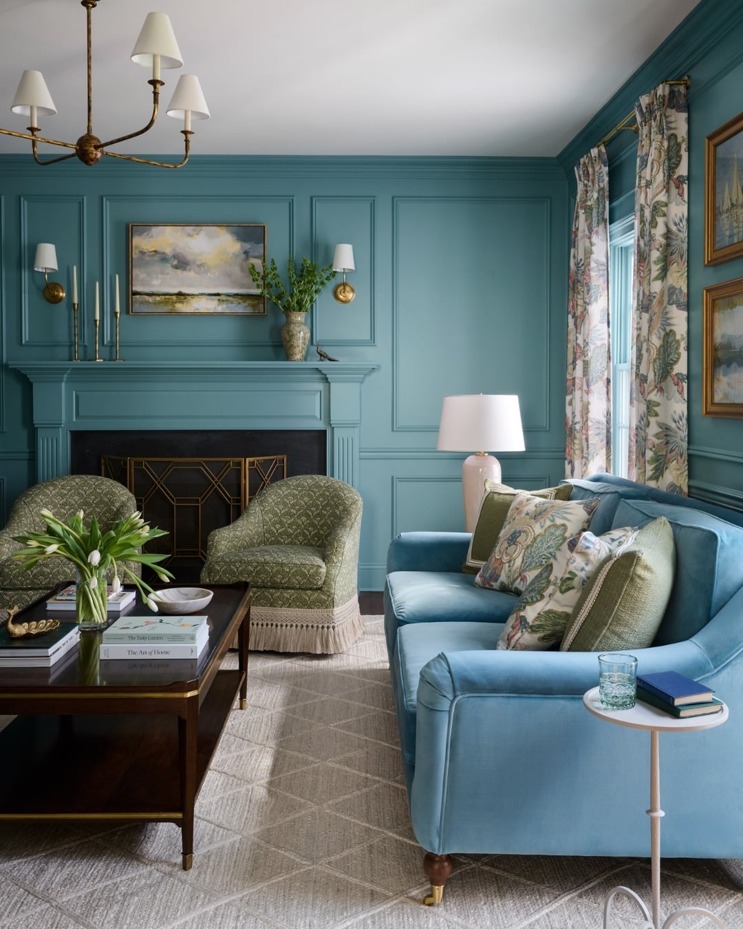 7. Traditional Blue-Gray Living Room with Elegant Millwork - navy blue and gray living room ideas