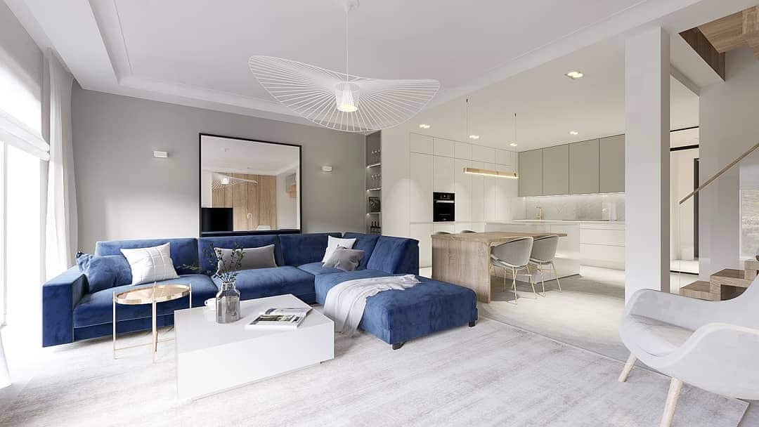 9. Minimalist Navy Sectional in a Light Gray Interior - navy blue and gray living room ideas