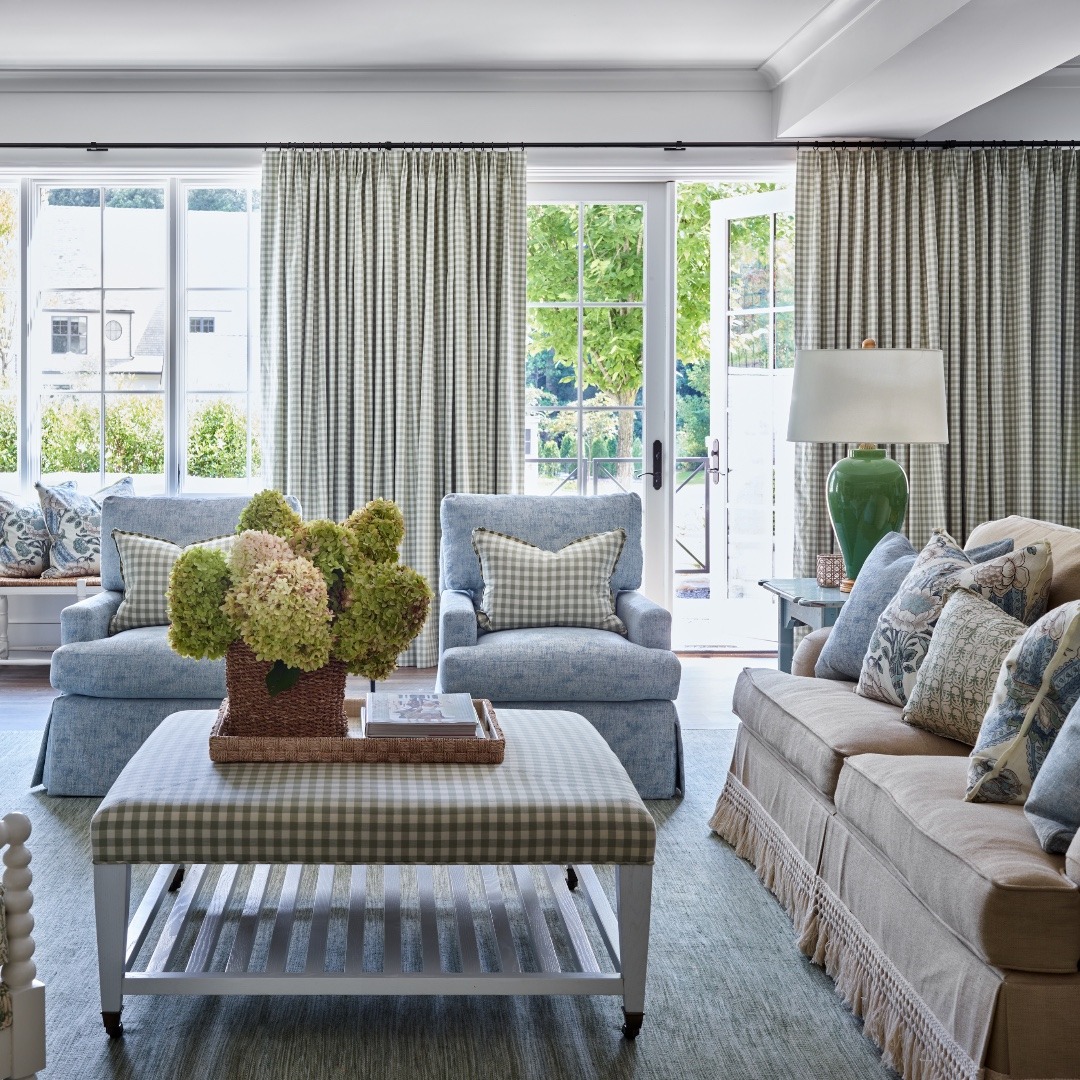 12. Light Gray Living Room with Blue Accents and Classic Drapery - navy blue and gray living room ideas
