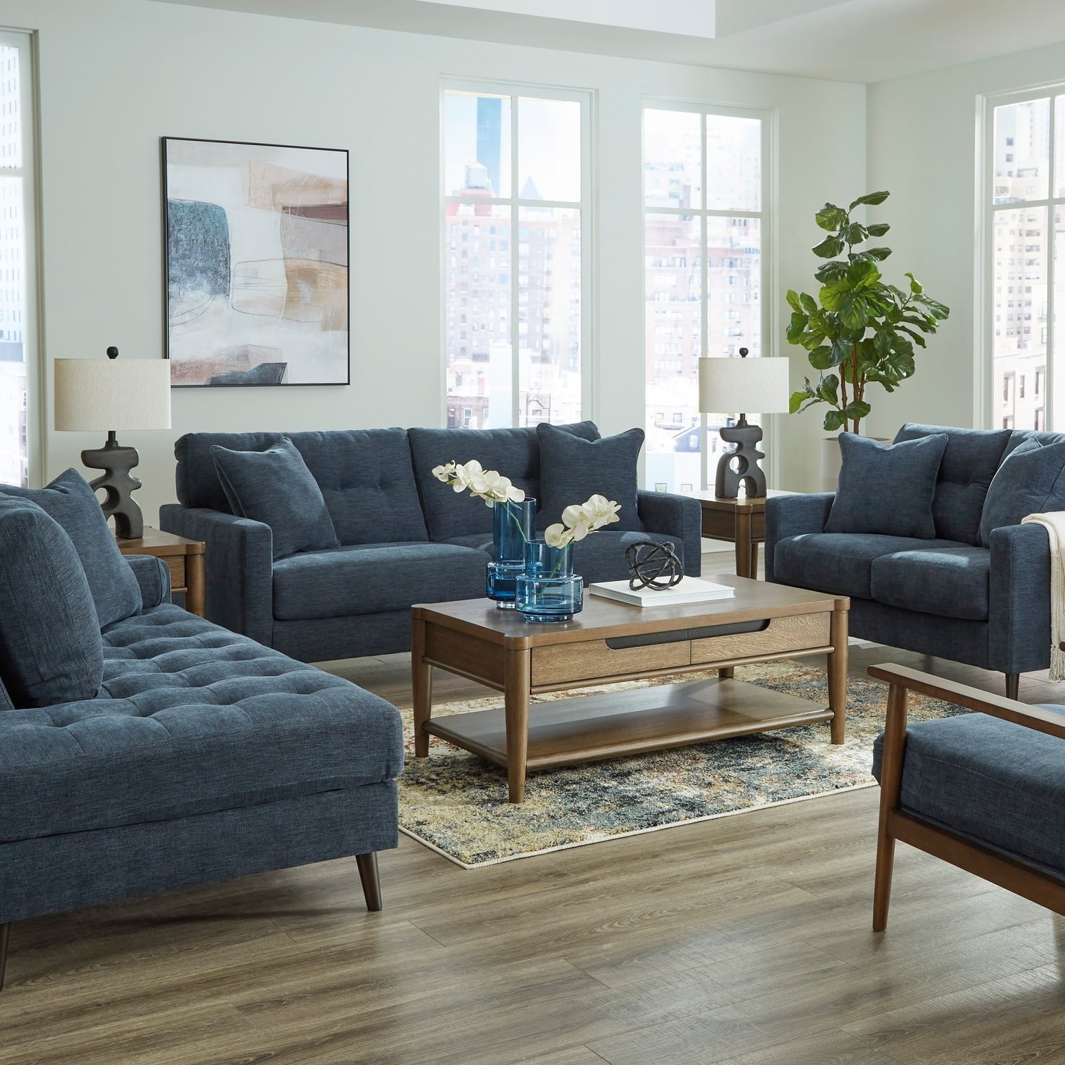 15. Contemporary Navy Seating with Urban Gray Backdrop - navy blue and gray living room ideas