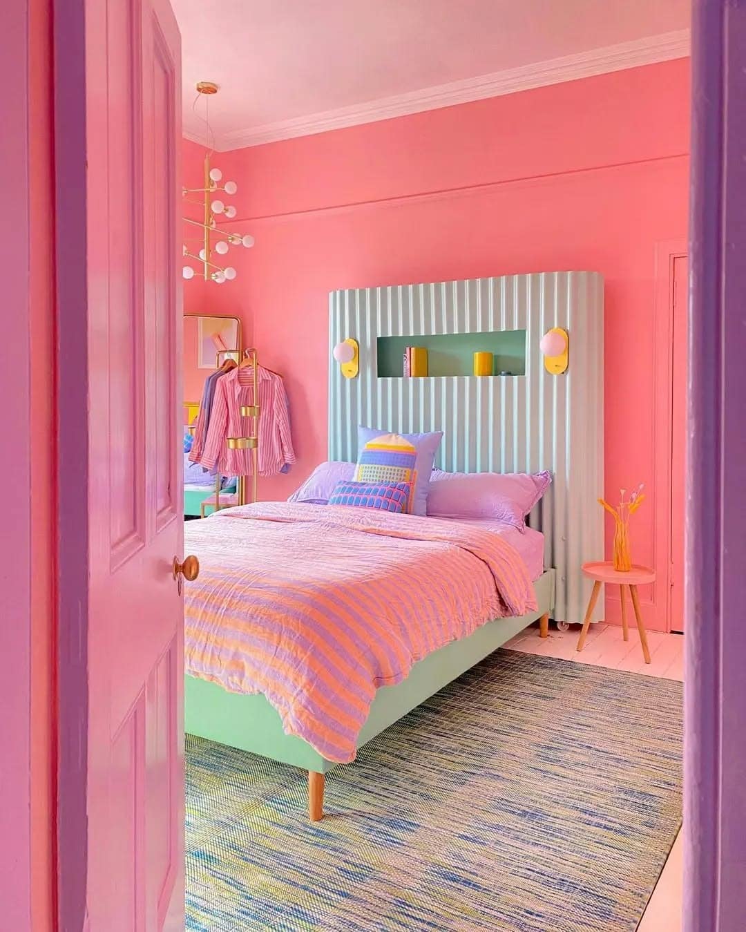 19. Coral Pink Bedroom with Playful Geometry - pastel bedroom ideas