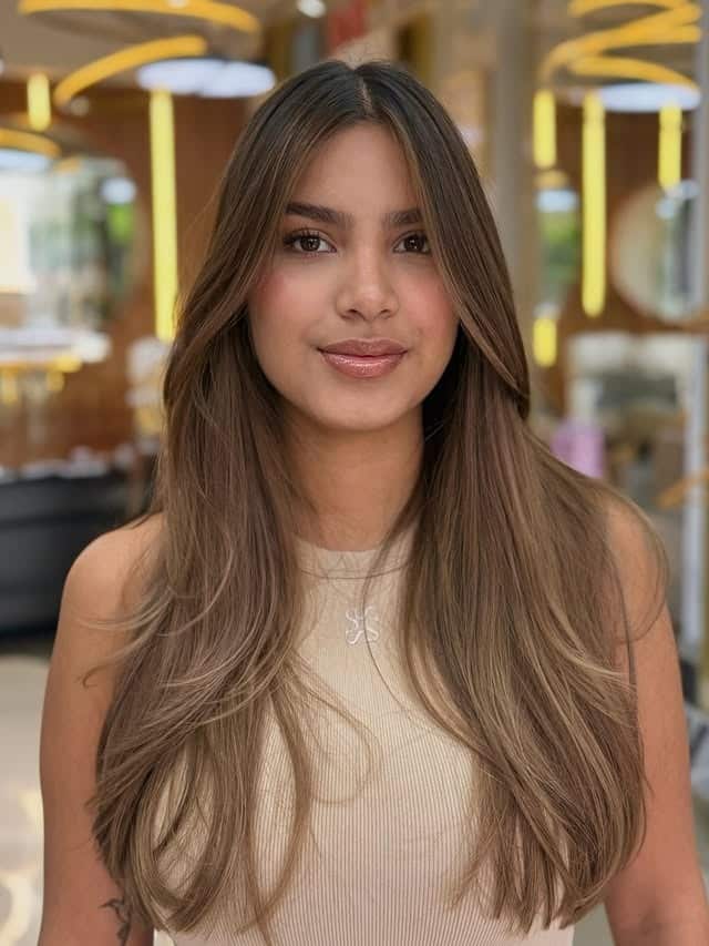 2. Sleek Long Layers with Beige Brown Highlights - Medium Brown Hair with Highlights