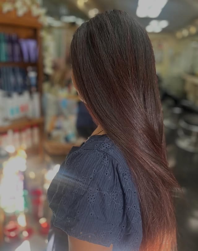 9. Glossy Straight Lengths with Natural Brown Tones - Medium Brown Hair with Highlights