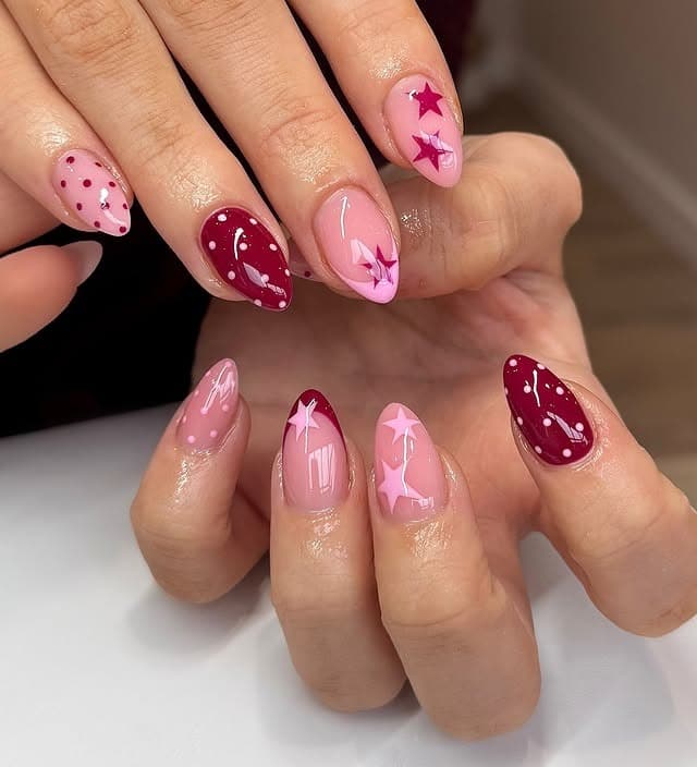 16. Pink and Burgundy Star Accent Nails - pink and red nail ideas