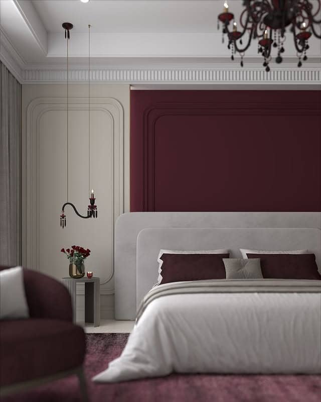 7. Burgundy Feature Wall with Elegant Molding - burgundy bedroom ideas