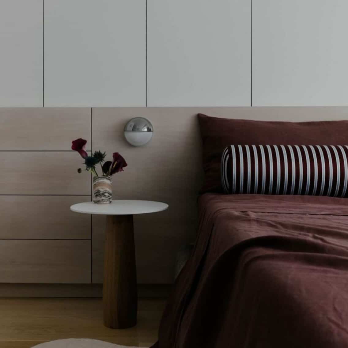 9. Burgundy Textiles in a Calm Modern Bedroom - burgundy bedroom ideas