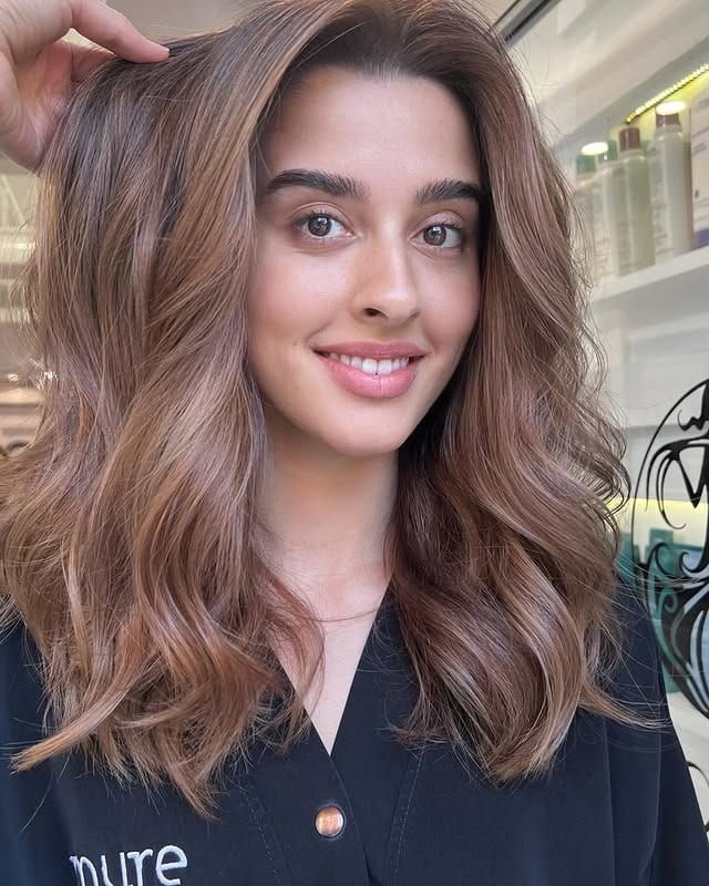 1. Soft Chestnut Layers with Natural Volume - Fall Hair Colors