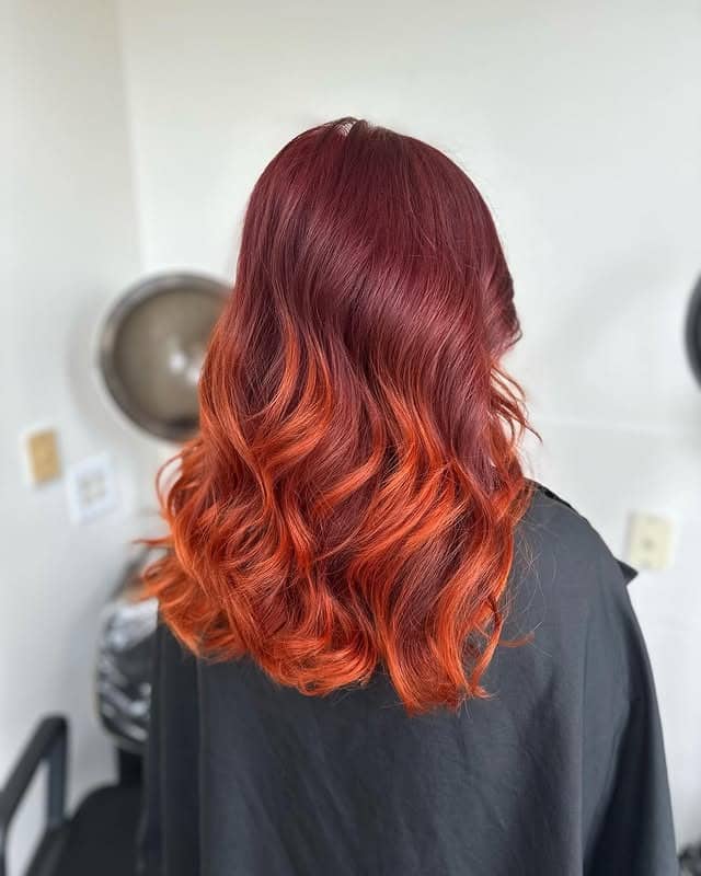 7. Deep Burgundy Melt with Soft Waves - Fall Hair Colors