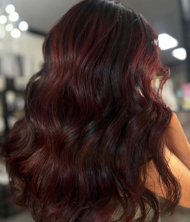 14. Dark Wine Waves with Subtle Red Tones - Fall Hair Colors