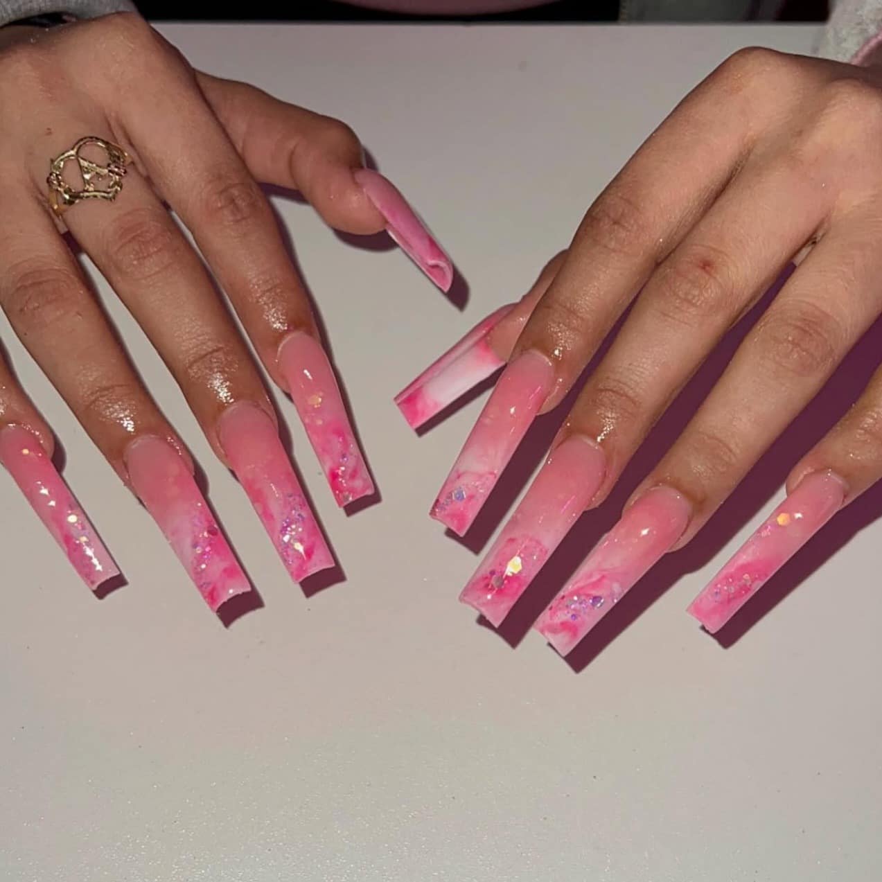 13. Long Coffin Pink Ombre with Encapsulated Sparkle - pink ombre nail ideas