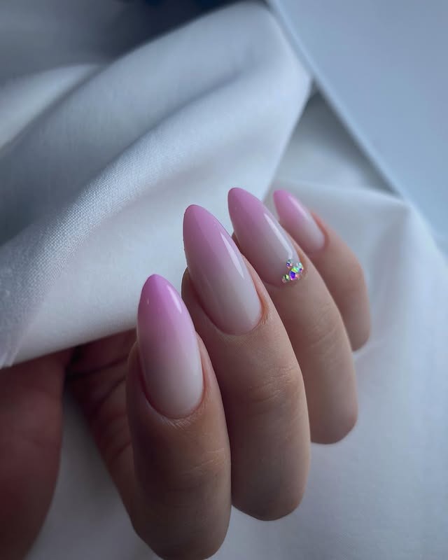 22. Almond Pink Ombre with Rhinestone Accent - pink ombre nail ideas