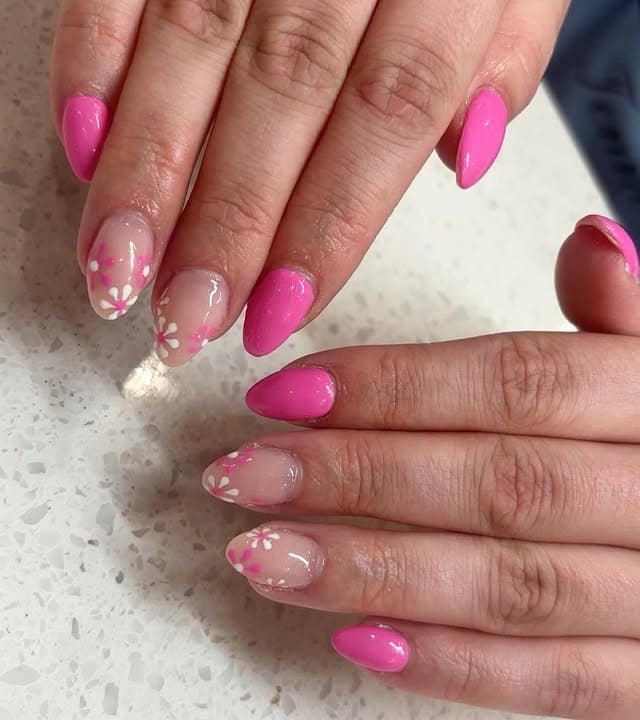 7. Bright Pink Almond Nails with Floral Feature Nails - pink spring nail ideas