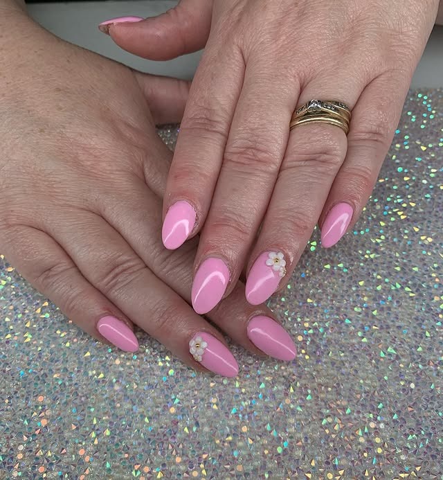 9. Textured Pink Acrylic Nails with Floral Charms - pink spring nail ideas