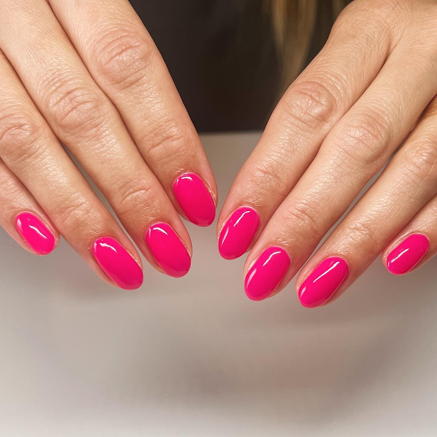 14. Glossy Pink Oval Nails in Solid Color - pink spring nail ideas