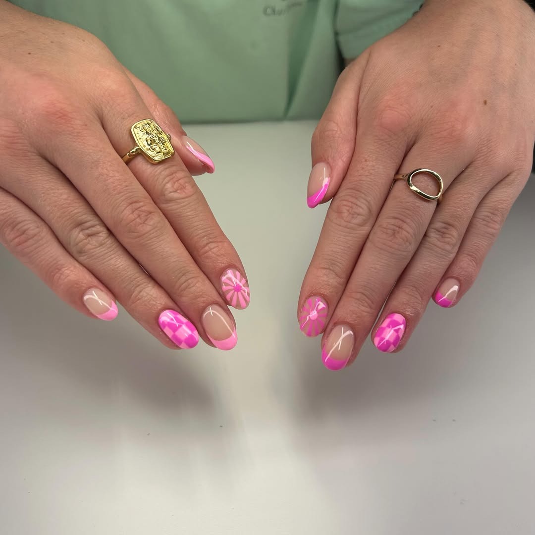15. Pink Almond Nails with Abstract Floral Tips - pink spring nail ideas
