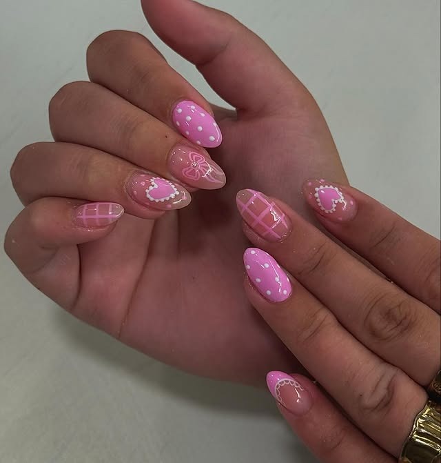 17. Light Pink Almond Nails with Sweet Pattern Art - pink spring nail ideas