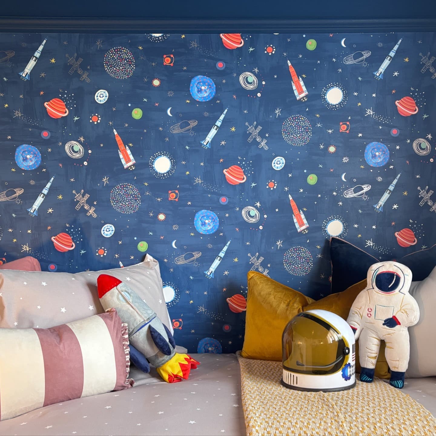 12. Playful Galaxy Wallpaper Bedroom in Navy and Mustard - space bedroom ideas