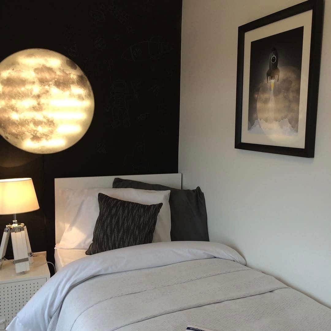 15. Modern Moon Accent Bedroom in Black and Warm White - space bedroom ideas