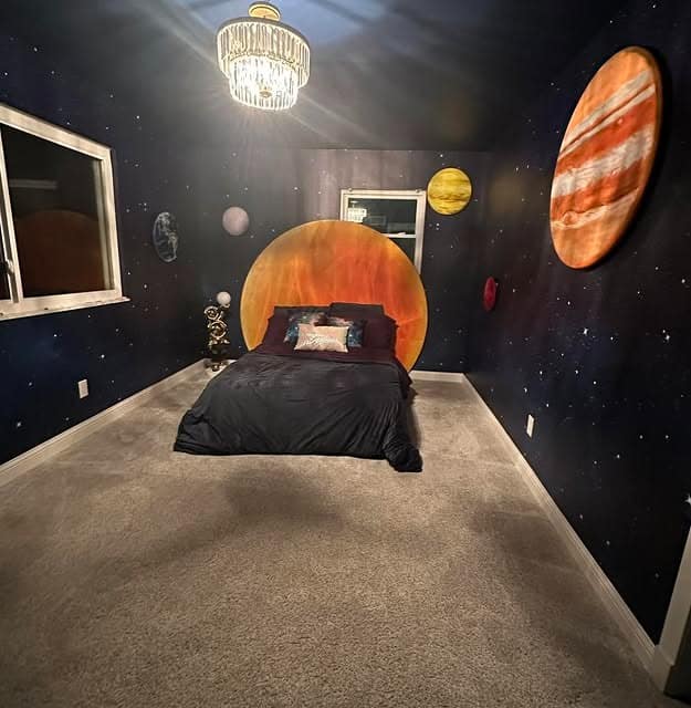 17. Planet Mural Bedroom in Midnight Blue and Charcoal - space bedroom ideas