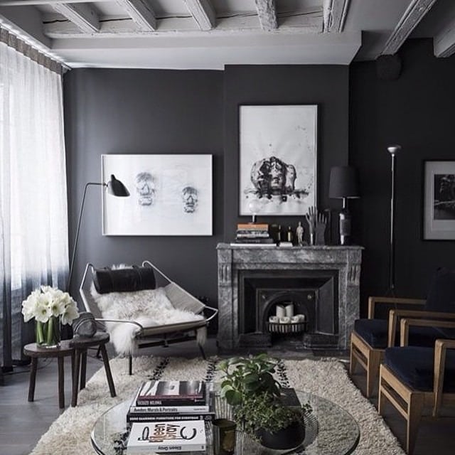 4. Soft Charcoal Living Room with Minimal Artwork - dark grey living room ideas