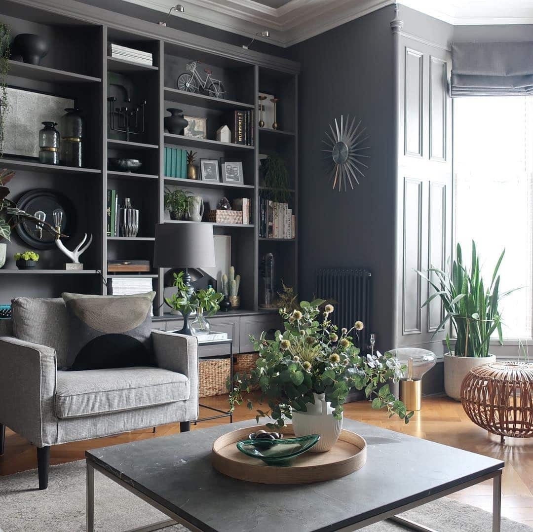 8. Elegant Dark Grey Living Room with Statement Sofa - dark grey living room ideas