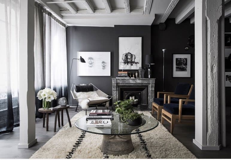 11. Textured Charcoal Living Room with Artistic Contrast - dark grey living room ideas