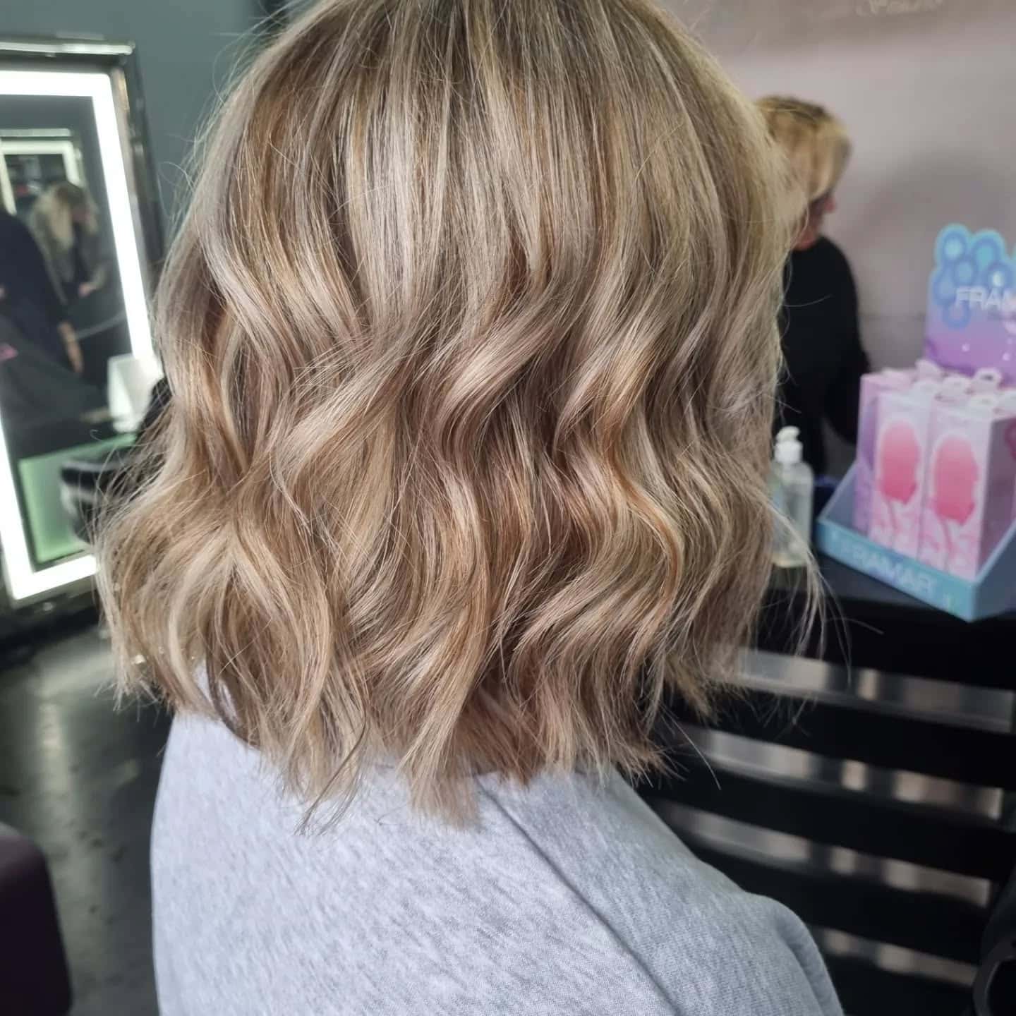 10. Neutral Sandy Blonde Wavy Bob with Natural Flow - Wavy Bob Hair