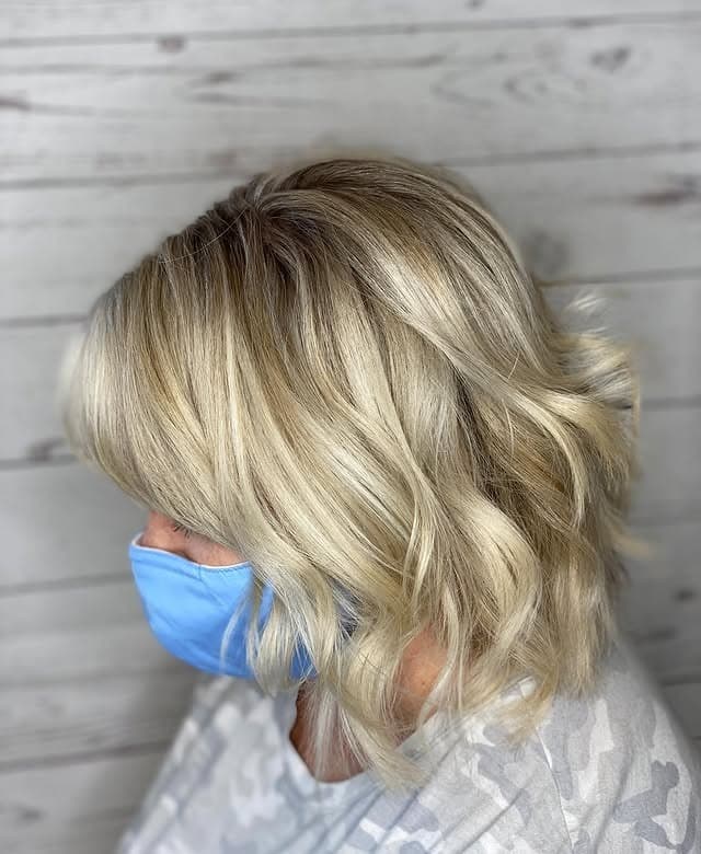 21. Soft Champagne Blonde Wavy Bob with Feathered Layers - Wavy Bob Hair