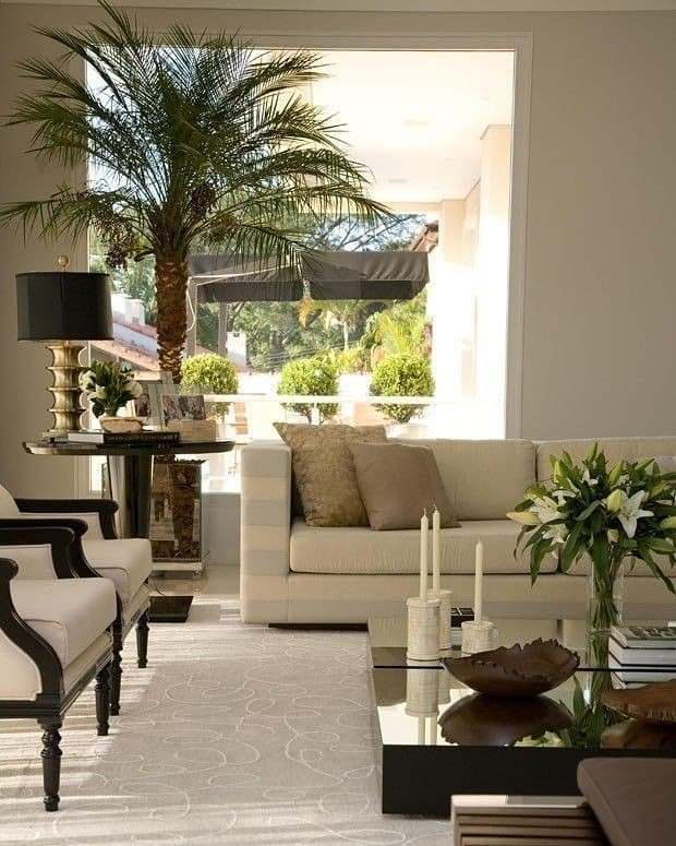 2. Classic Beige Living Room with Black Accents - beige couch living room ideas