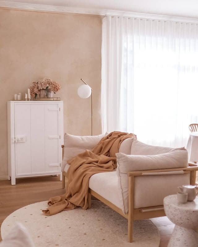 13. Cozy Neutral Living Room with Beige and Warm Sand - beige couch living room ideas