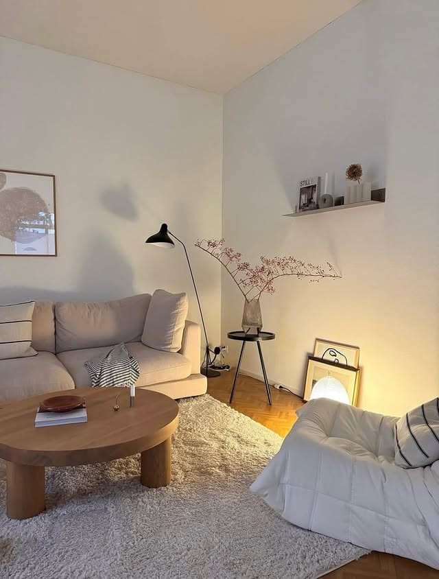 14. Minimal Beige Living Room with Soft Contrast - beige couch living room ideas