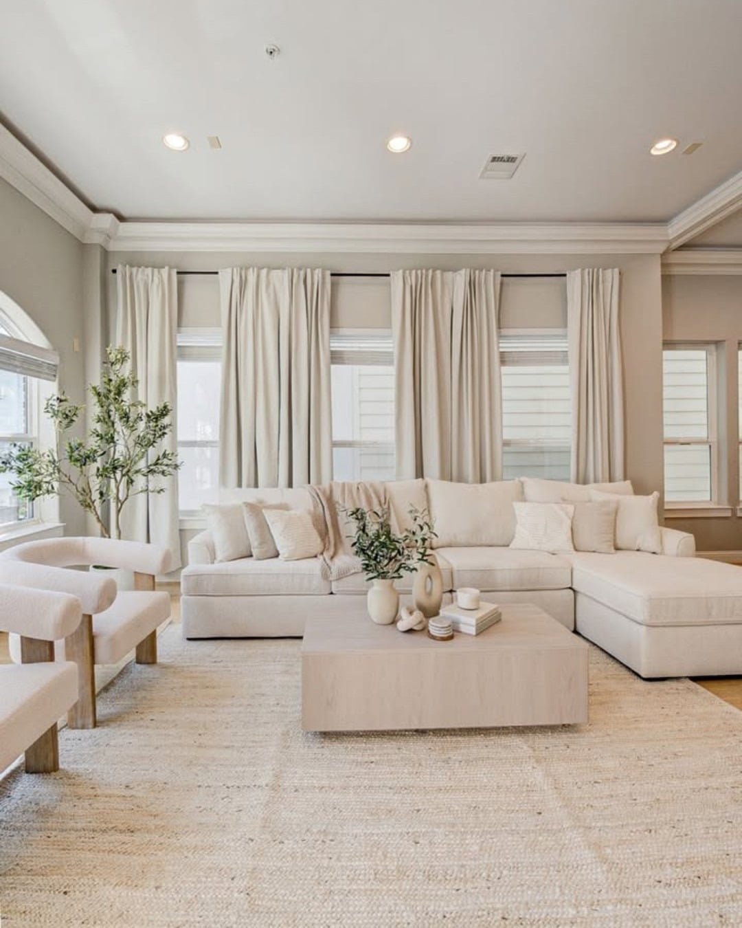 16. Timeless Neutral Living Room with Beige Sectional - beige couch living room ideas