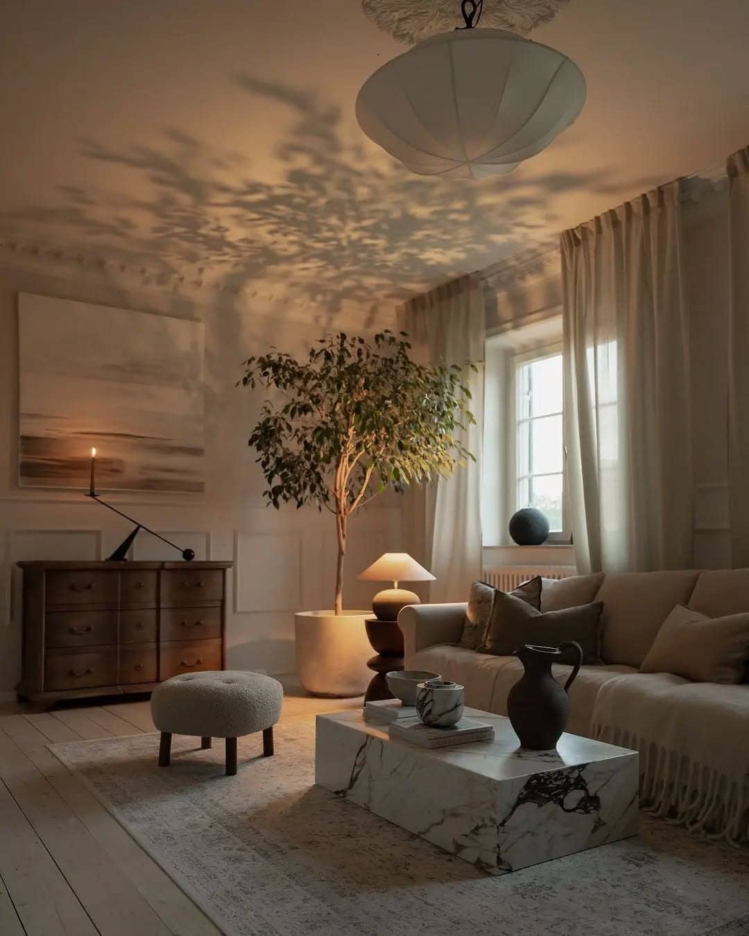 22. Moody Neutral Living Room with Beige Sofa - beige couch living room ideas