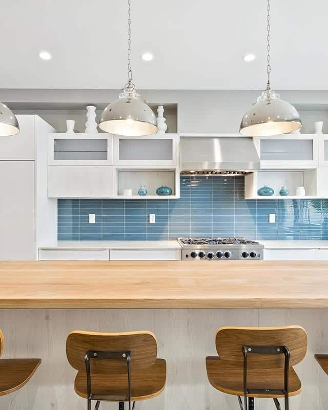 9. Modern Open Kitchen with Soft Blue Horizontal Tile - blue backsplash kitchen ideas
