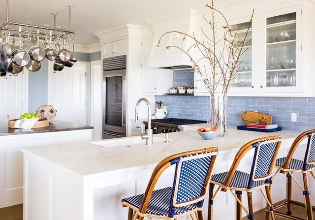 14. Elegant White Kitchen with Pale Blue Brick Backsplash - blue backsplash kitchen ideas