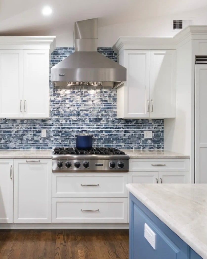 21. Timeless White Kitchen with Blue Mosaic Tile Backsplash - blue backsplash kitchen ideas