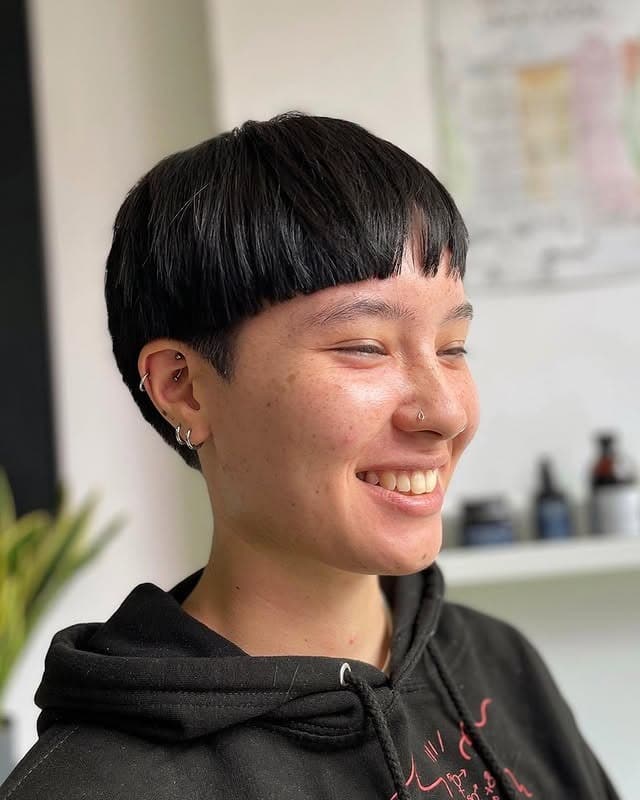 10. Graphic Asymmetrical Bowl Cut in Deep Black - Asymmetrical Hairstyles