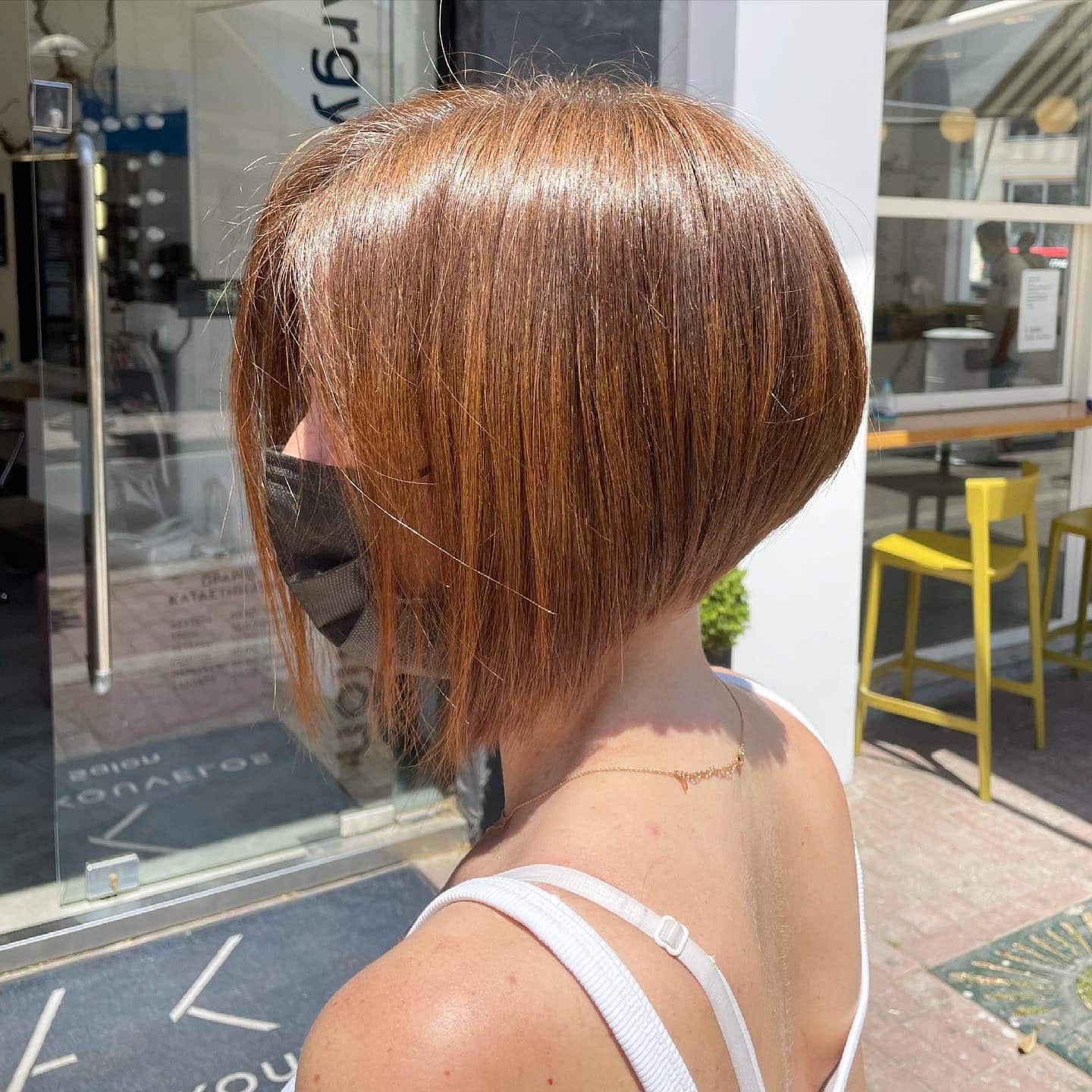 13. Angled Asymmetrical Bob in Warm Copper Brown - Asymmetrical Hairstyles