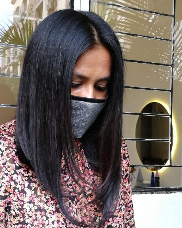 16. Straight Asymmetrical Lob in Deep Black - Asymmetrical Hairstyles