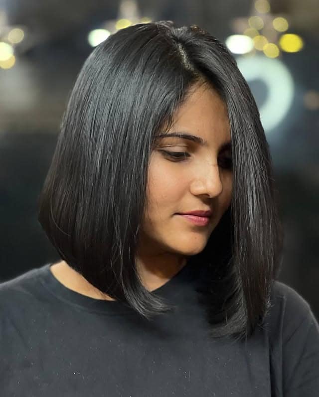 21. Smooth Asymmetrical Bob in Natural Black - Asymmetrical Hairstyles