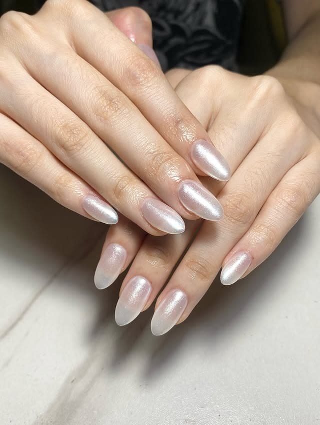 4. Pearl Sheen Almond Nails - plain nail ideas