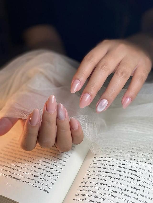 7. Milky Pink Natural Almond Nails - plain nail ideas