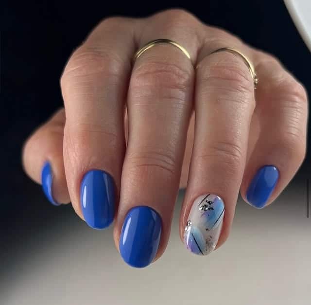 14. Cobalt Blue Short Oval Nails with Accent Detail - plain nail ideas