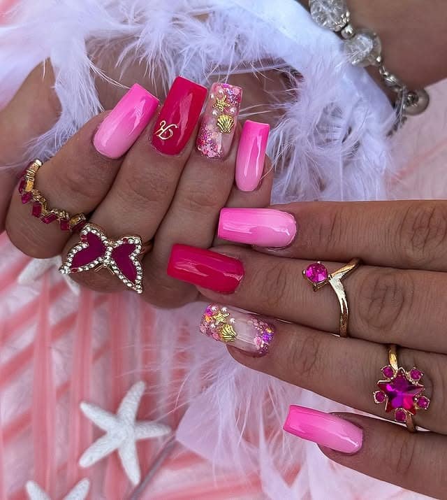 6. Glossy Pink Statement Nails with Embellishments - pretty pink nail ideas