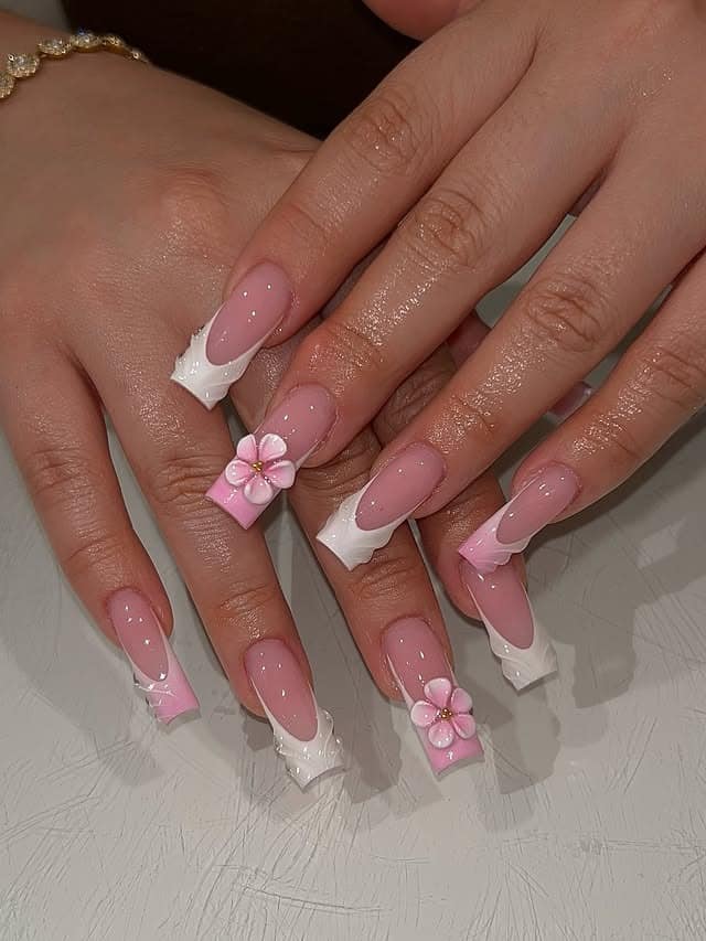8. Pink Almond Nails with Minimal Floral Accent - pretty pink nail ideas