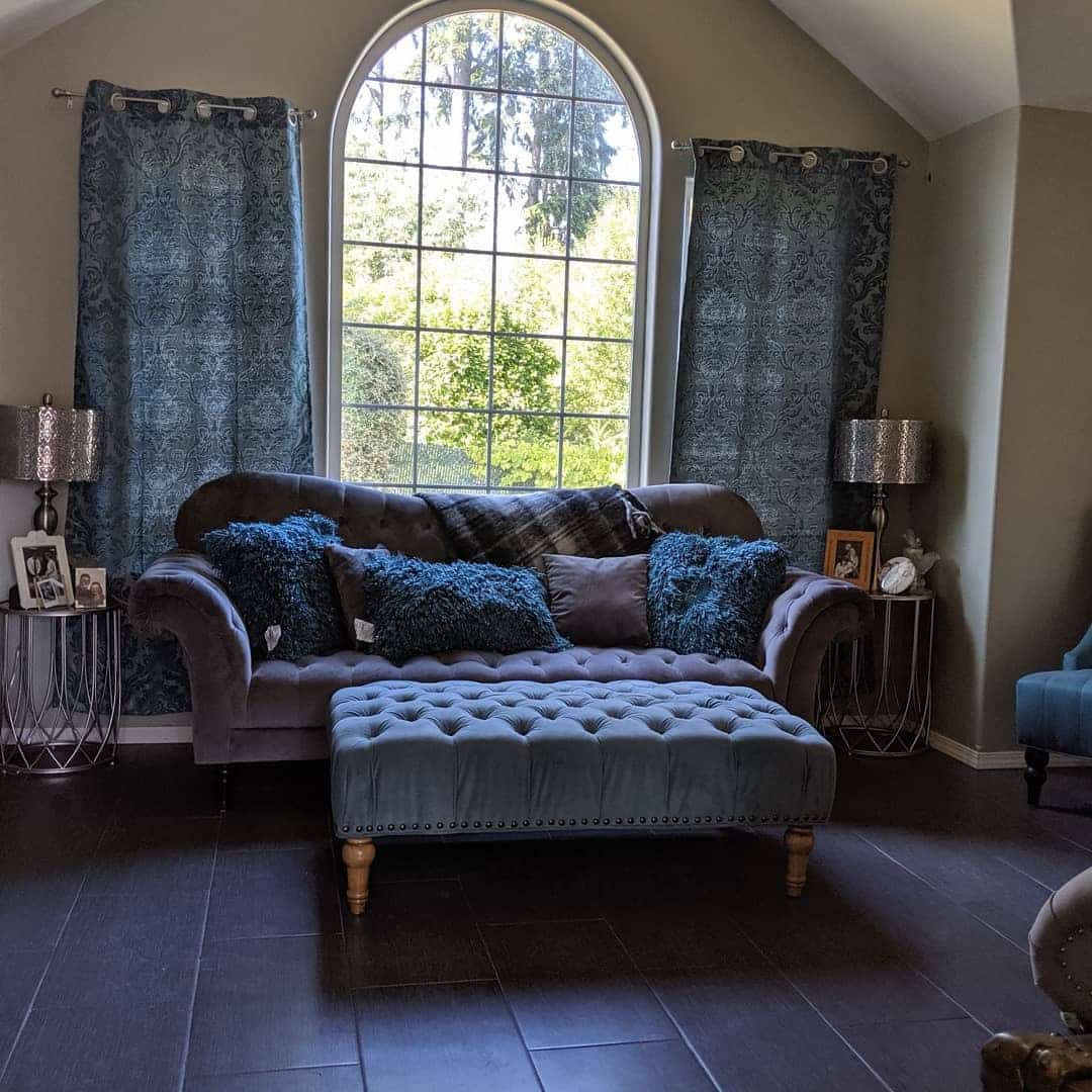 10. Dramatic Gray Lounge with Teal Window Treatments - gray and teal living room ideas